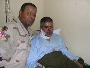 Platoon Sergeant visit wounded Gunner at the 